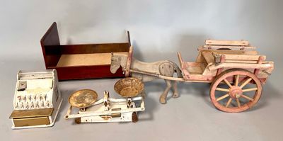 a toy horse drawn carriage with a wooden box on the back