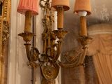 a picture of a chandelier and a mirror in a room