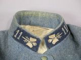 a close up of a military uniform with a collar