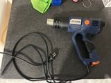 a picture of a corded hot glue gun and a corded hot glue gun