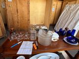 a table with a lot of plates and glasses on it