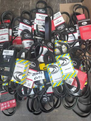 many different types of belts on the floor
