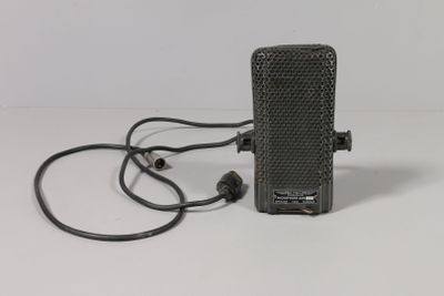 a small radio that is plugged into the wall