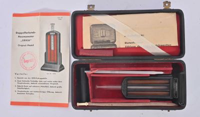 a box with a pen and a pencil inside of it