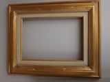 an image of a picture frame hanging on a wall in a room