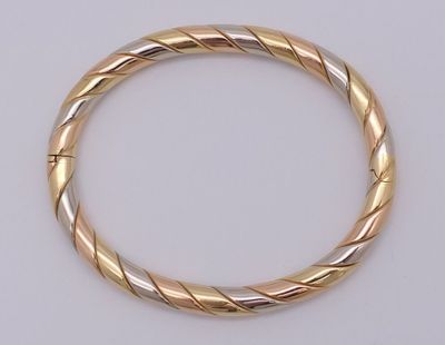 Bracelet semi-rigide en or 750 trois tons. - Photo 1