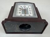 a clock that is sitting on a table