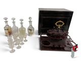 a lot of glass bottles and a box on the table