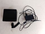 a tablet and headphones on a table next to each other