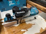a machine that is sitting on top of a wooden table