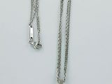 Collier en argent plaqué, orné d'un pendentif circulaire monté sur une chaîne en argent
