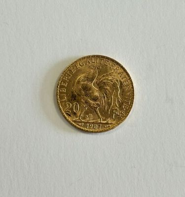 an image of a gold coin on a white surface