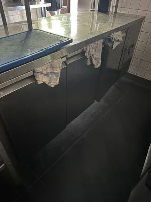 an image of a kitchen with a sink and a counter