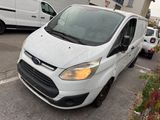 a white van that is parked in a parking lot