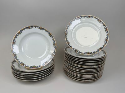 many plates stacked on top of each other on a table