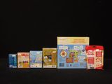 a lot of different types of cereals on the table