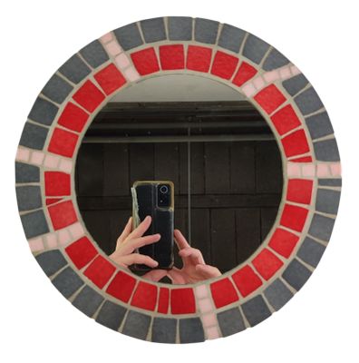 someone is taking a picture of themselves in a mirror with a cell phone