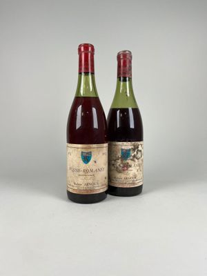 deux bouteilles de vin posées l'une à côté de l'autre sur une table