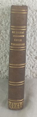 a brown book that is sitting on a table