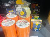 many rolls of tape on the shelf in the store