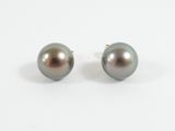 a pair of pearl earrings on a white background