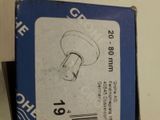 a box of screws sitting on top of a table