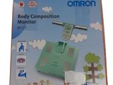 a box with a digital body composition monitor on it