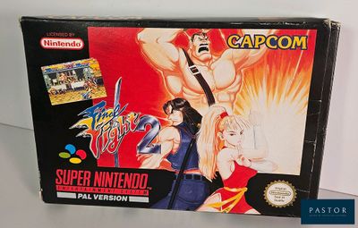 une boîte sur laquelle figure un jeu vidéo, posée sur une table