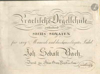 an old book with a black and white design on it