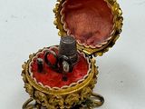a small box that has a ring inside of it