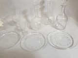 a lot of glass items sitting on a table