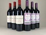 six bouteilles de vin sont alignées sur une table