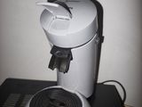 a coffee maker that is sitting on top of a table