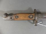 a knife that is on display on a table