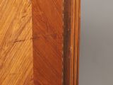 an image of a wooden cabinet with a marble top