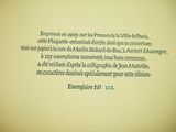 an old book with a poem written in french on it