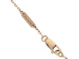 a close up of a gold chain with a clasp on it