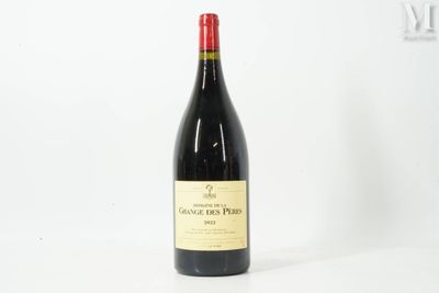 a bottle of wine that is sitting on a table