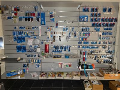 many items on the wall in the store
