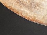 a large knife that is sitting on a table