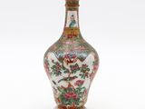 an image of a vase with flowers and birds painted on it