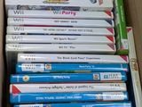 a lot of wii games in a box together
