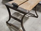 a small table with a wooden top in a room