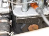 a close up of a carbuke with a hose connected to it