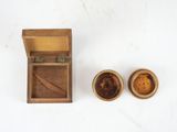 a small wooden box and two small wooden bowls