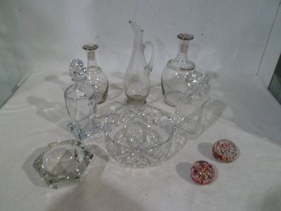 a lot of glass items that are on a table