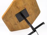 a small wooden table with a metal stand on it