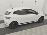 a picture of a white car parked in a garage