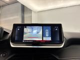 the dashboard of a car with a display of a car ' s camera