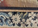 an image of a close up of a rug on a wooden table